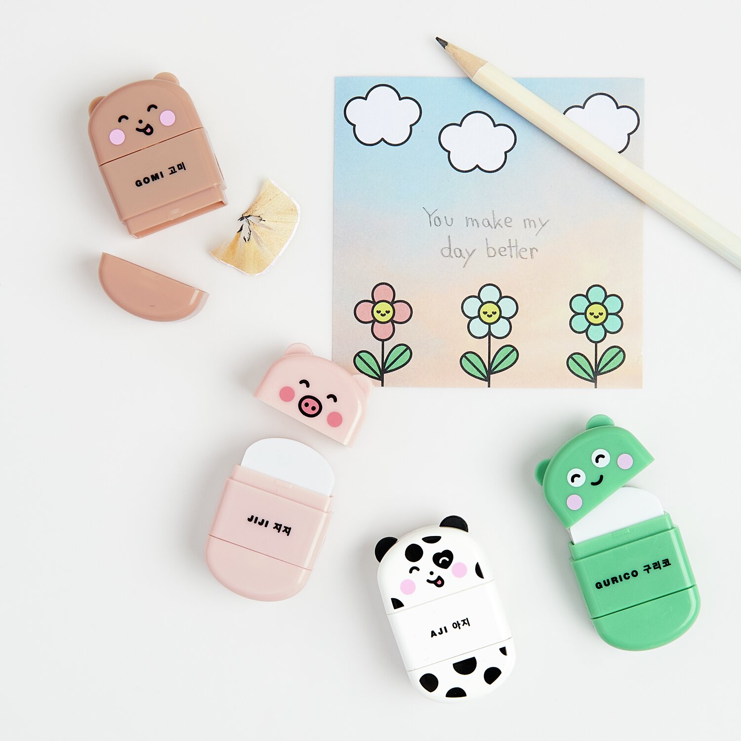 Paper Poetry Radiergummi mit Anspitzer Hund, Frosch, Schwein und Bär auf weißem Hintergrund.