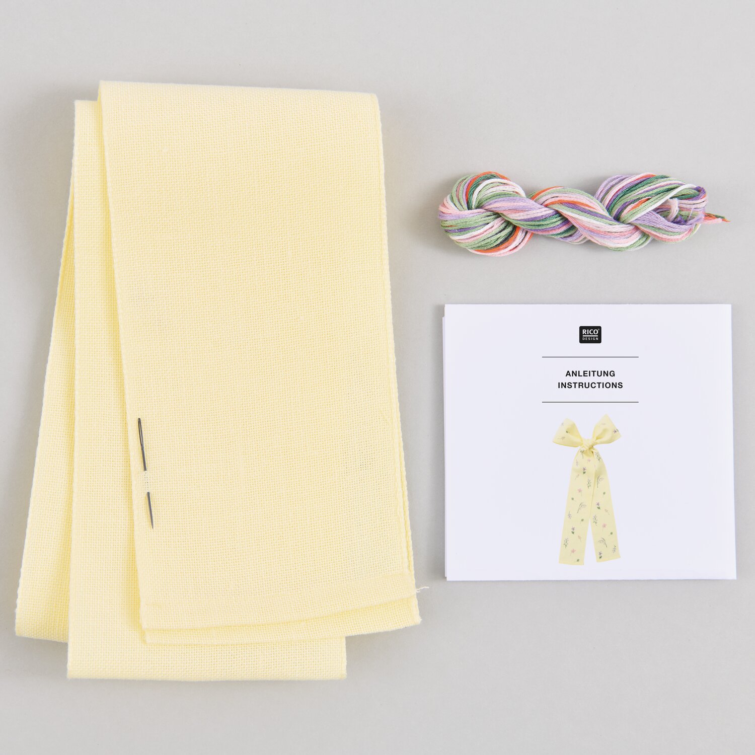 Stickpackung Gezählter Kreuzstich Schleife Wiesenblumen 30x54cm Farbe Hellgelb von Rico Design