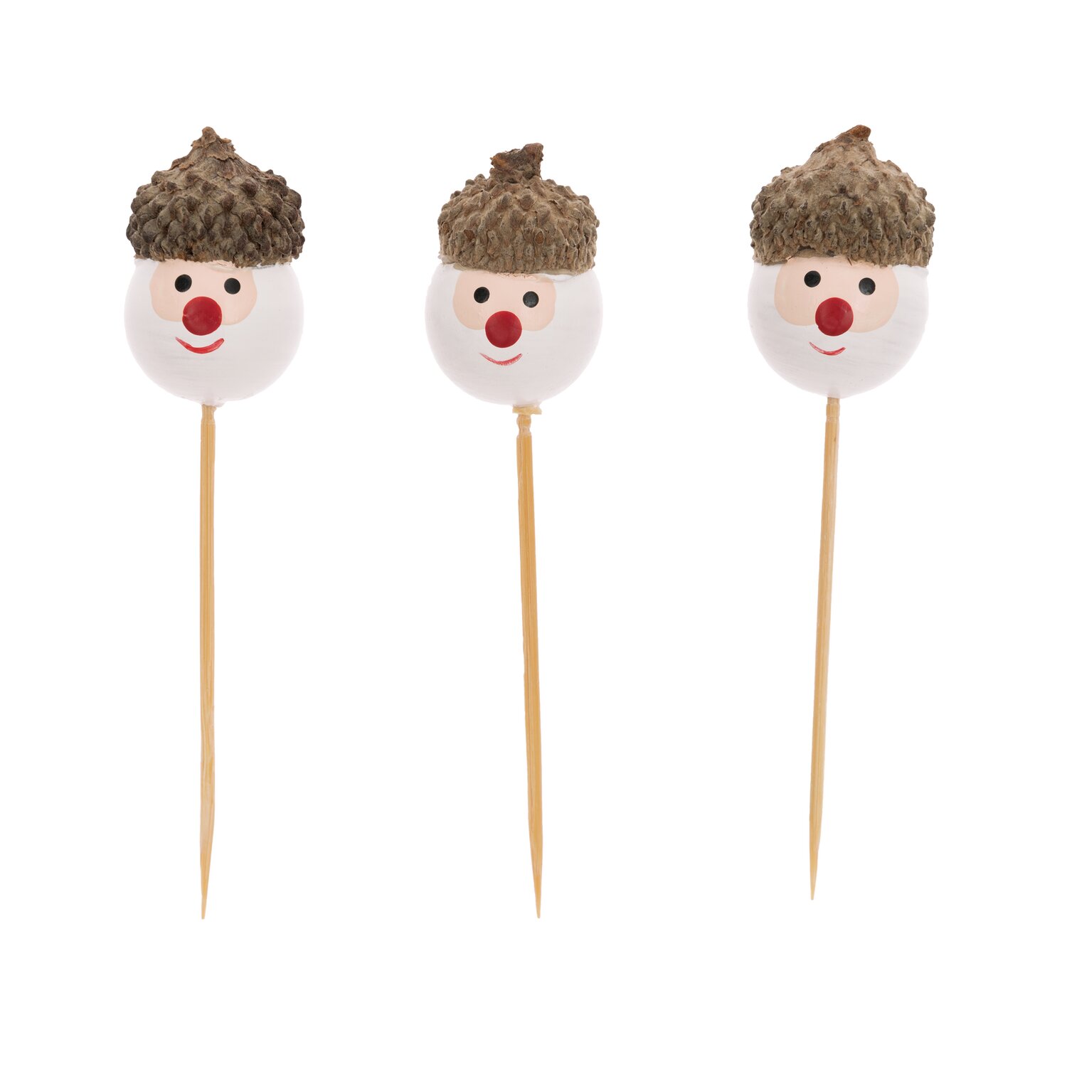 Sticks Weihnachtsmann weiß 3 Stück: Drei weiße Weihnachtsmann-Sticks mit braunen Mützen, ideal für festliche Dekorationen.