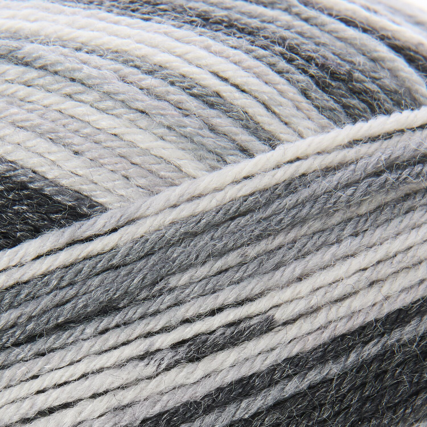 Superba Bamboo superwash, anthrazit Mix. Weiches Garn mit Farbverlauf in Grautönen, ideal für Strickprojekte. 100g, 420m.