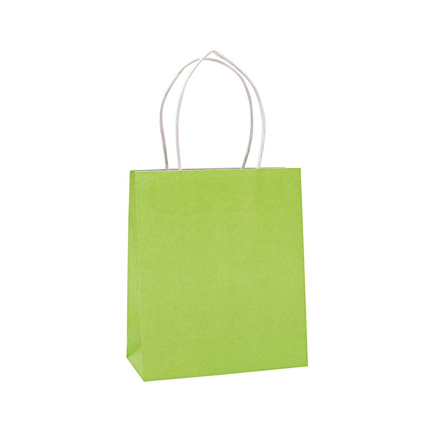 Papiertüte grün: Stilvolle Tragetasche von Rico Design in lebhaftem Grün mit weißen Griffen.