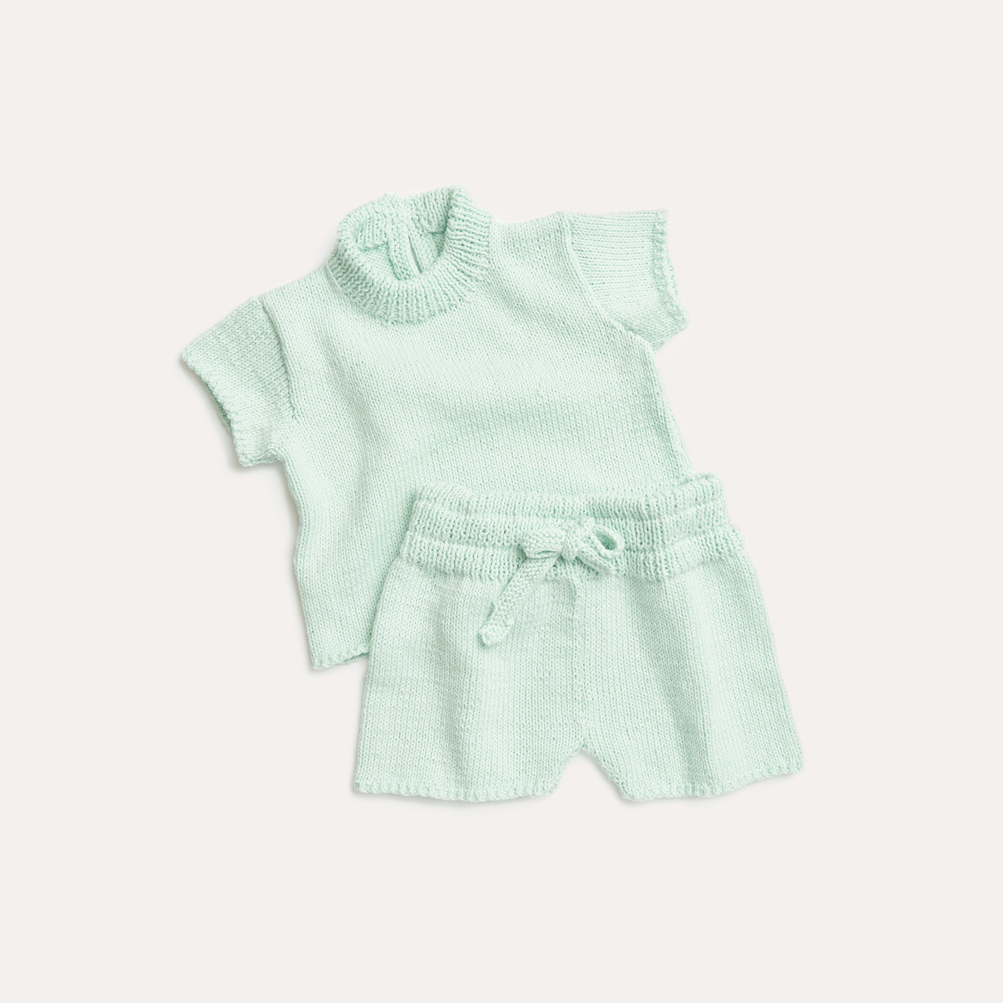 Strick Babykleidung
