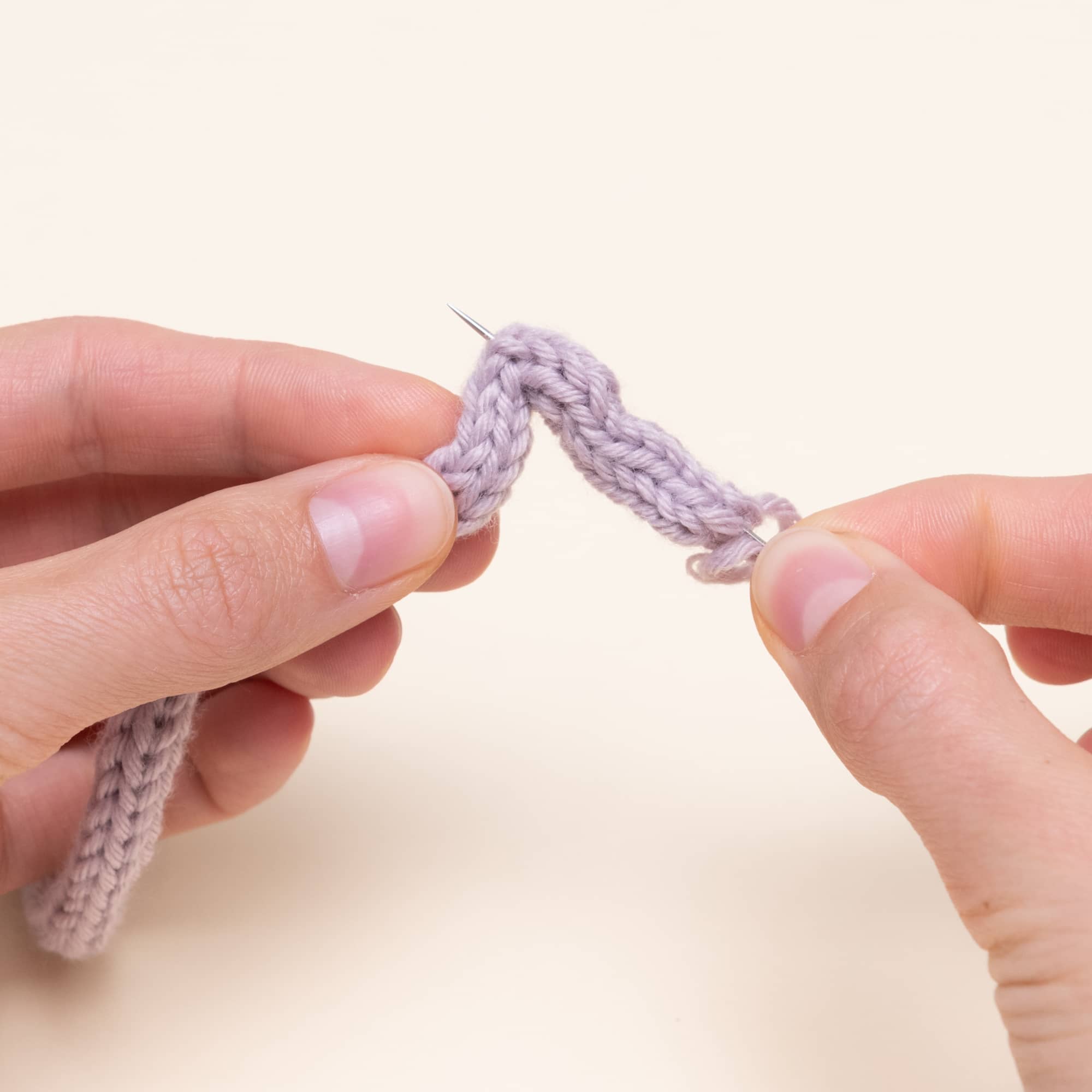 Schritt 17 in der Bedienung einer Strickmühle