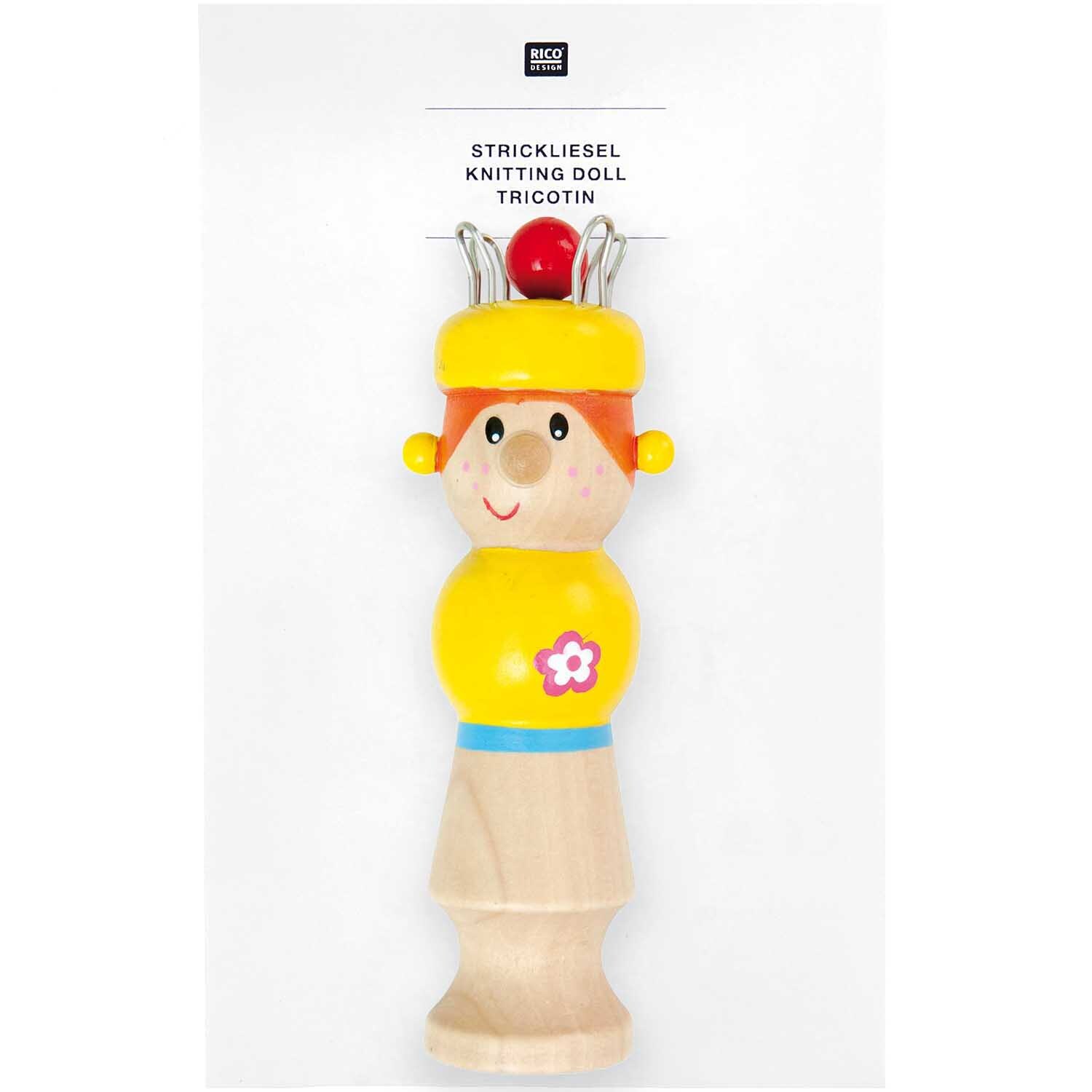 Strickliesel Cathy Gelb: Bunte Strickpuppe von Rico Design mit gelbem Oberteil und Blumenmotiv.