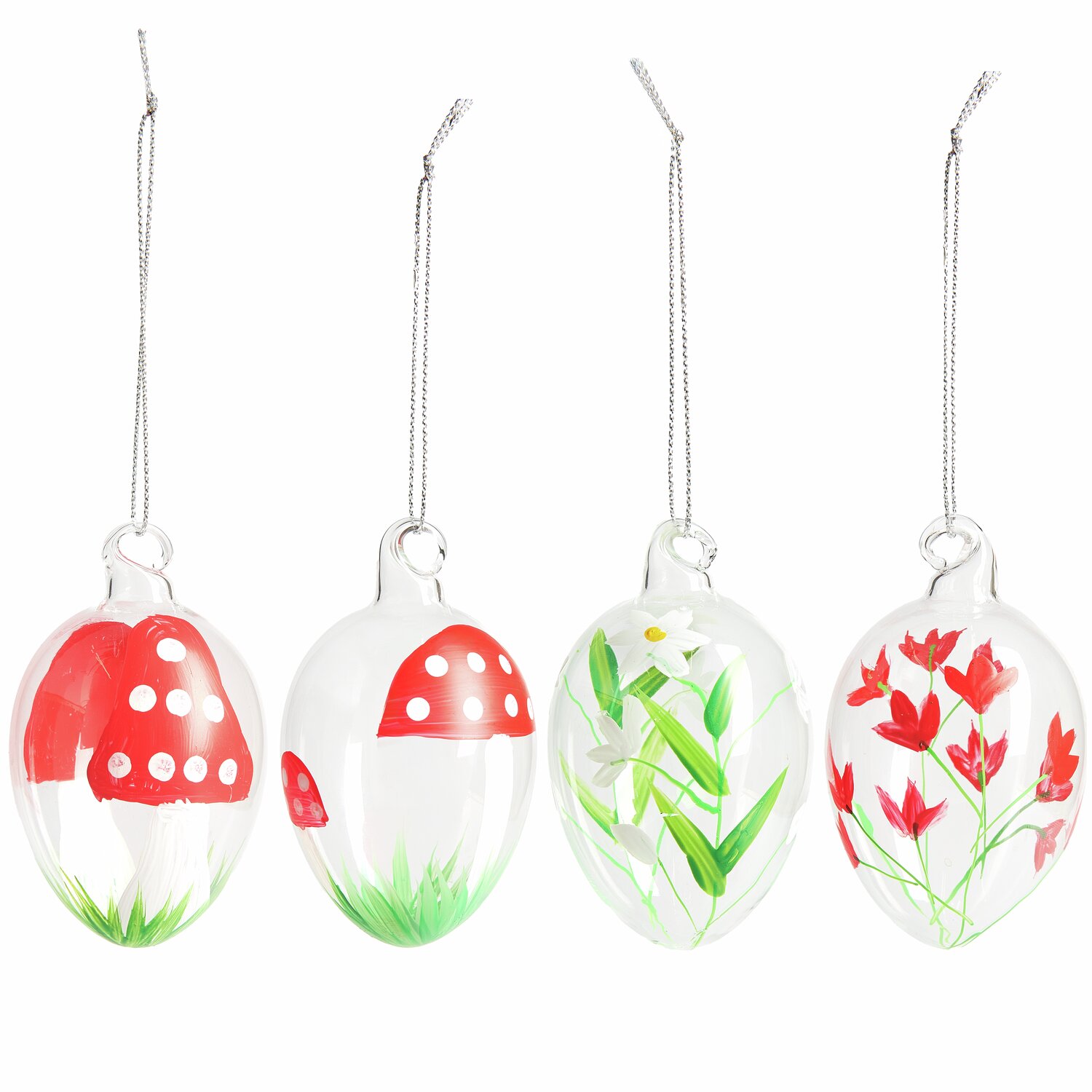 Glas Eier Fliegenpilz/Blumen 4 Stück: Vier transparente Glaseier mit roten Pilz- und Blumenmotiven, ideal für dekorative Zwecke.