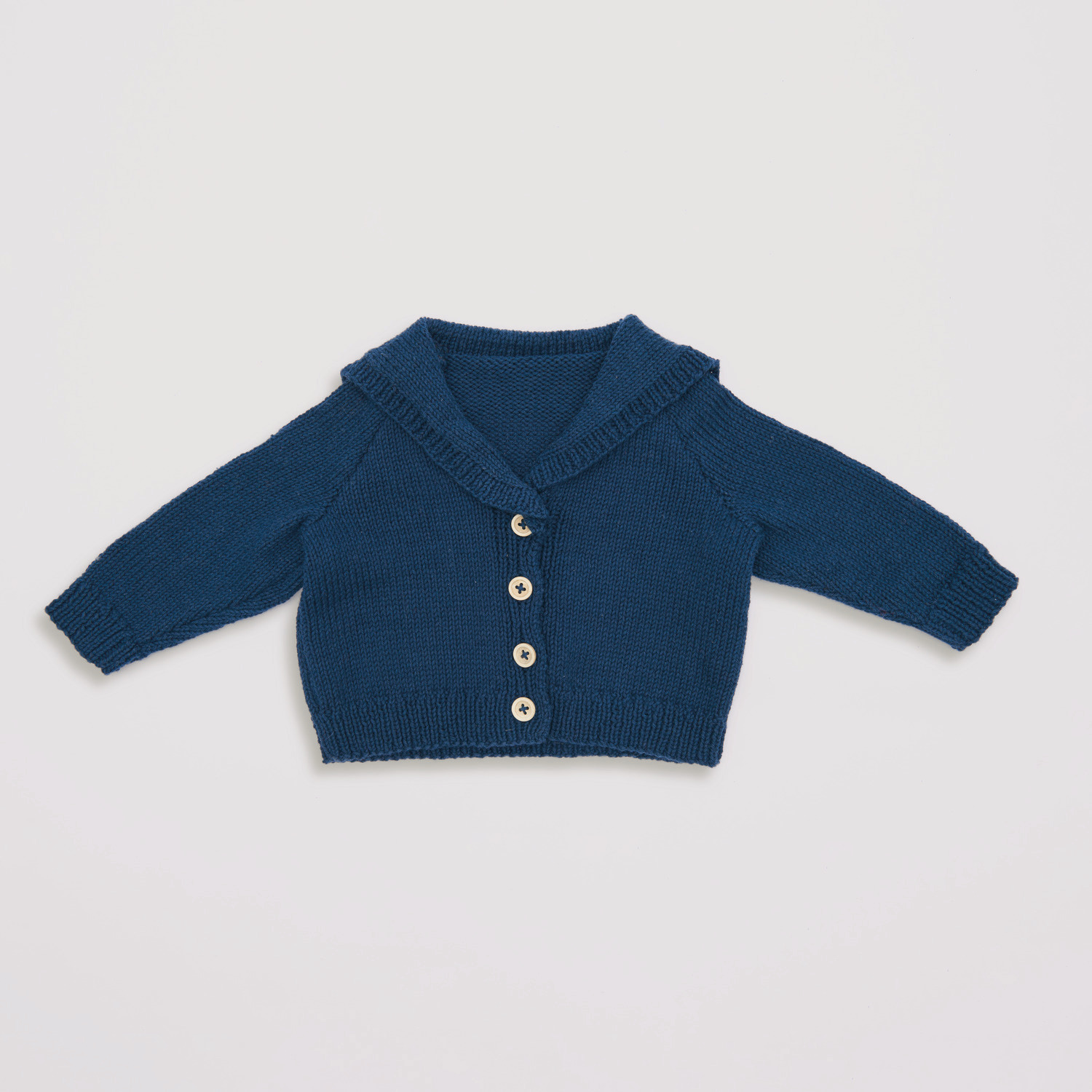 Baby Organic Cotton: Marineblauer Strickpullover mit Knopfleiste, aus Bio-Baumwolle, 50g 150m.