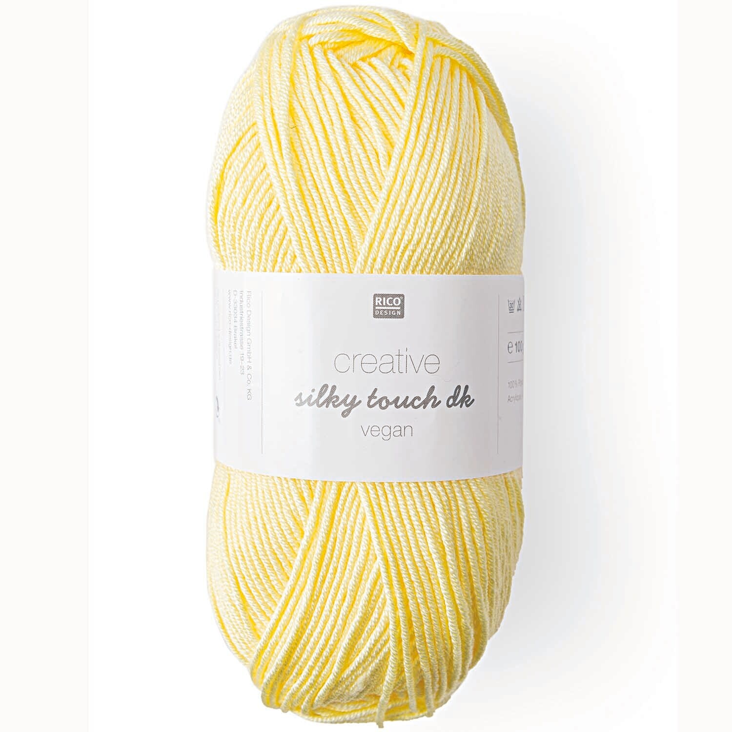Creative Silky Touch dk: Weiches, pastellgelbes Garnknäuel von Rico Design, ideal für vegane Strickprojekte.