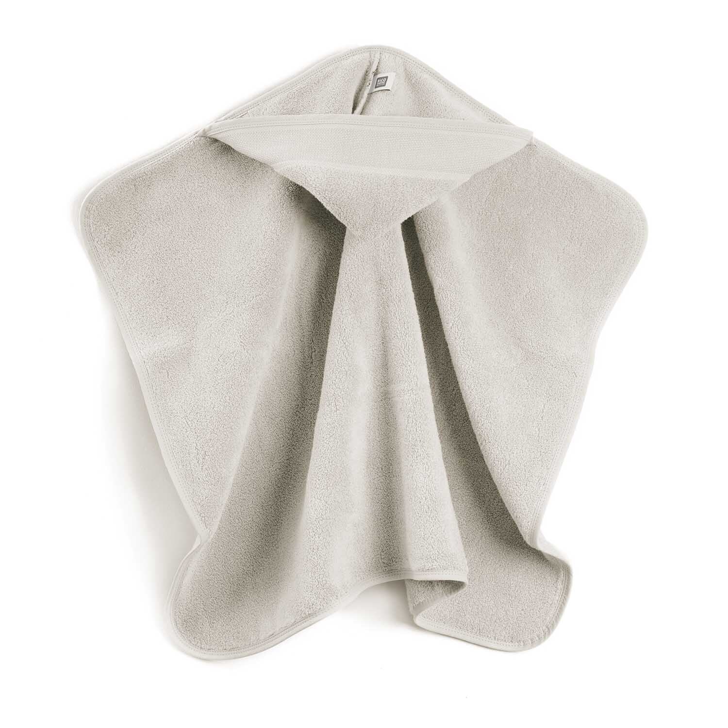 Badetuch mit Kapuze 80x70cm Farbe Betongrau von Rico Design Badetuch mit Kapuze 80x70cm in Betongrau von Rico Design, ausgebreitet auf weißem Hintergrund. Ideal für Babys und Kleinkinder.