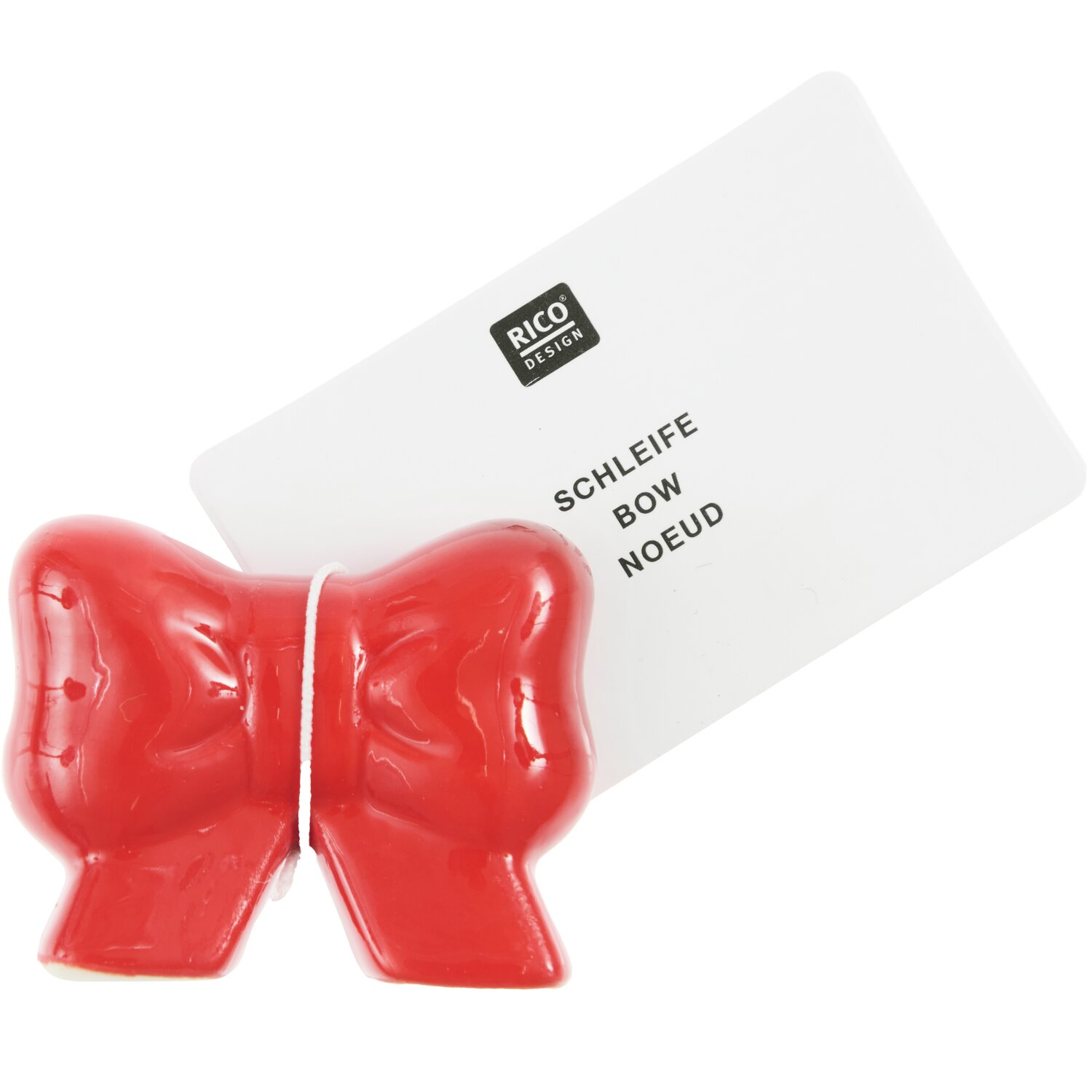 Porzellan Schleife 3,2x4,1x1,6cm Farbe Rot von Rico Design Porzellan Schleife von Rico Design in leuchtendem Rot, elegant vor einer weißen Karte präsentiert.