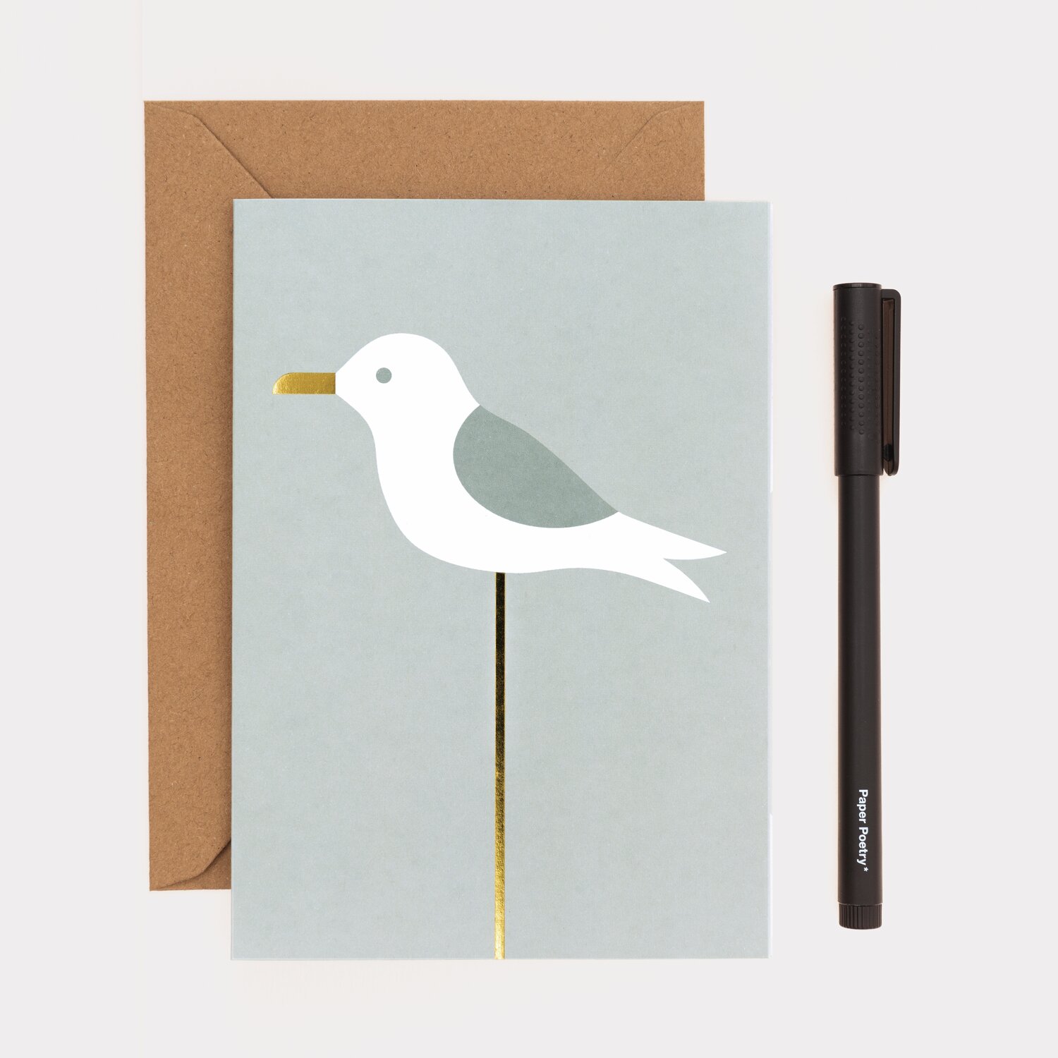 Paper Poetry Kartenset Möwe, 20-teilig, zeigt eine stilisierte Möwe auf hellblauer Karte mit braunem Umschlag und schwarzem Stift.