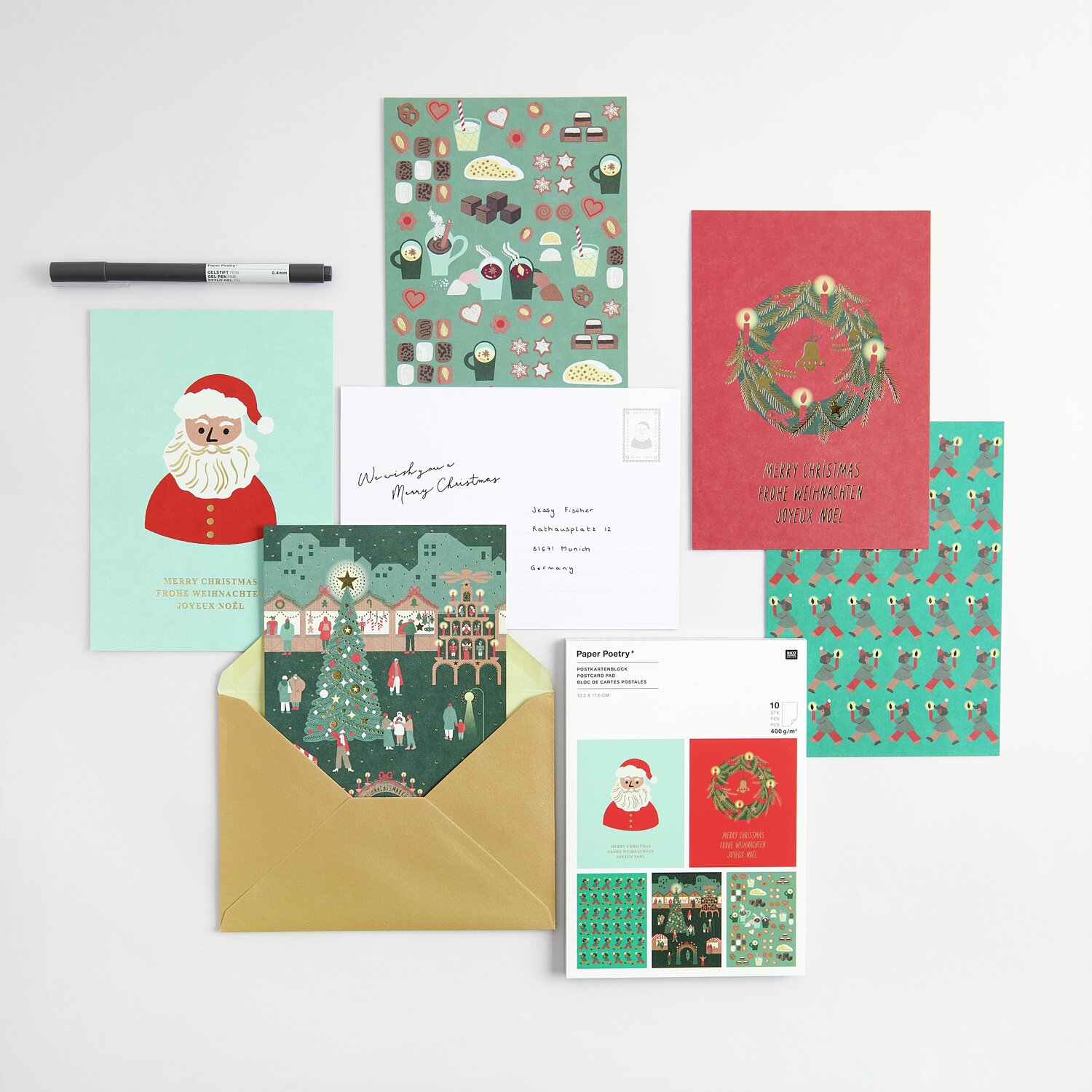 Paper Poetry Postkartenblock Weihnachtsmarkt 10 Stück mit festlichen Motiven in Rot und Grün, ideal für Weihnachtsgrüße. Größe: 12,5x17,6cm.