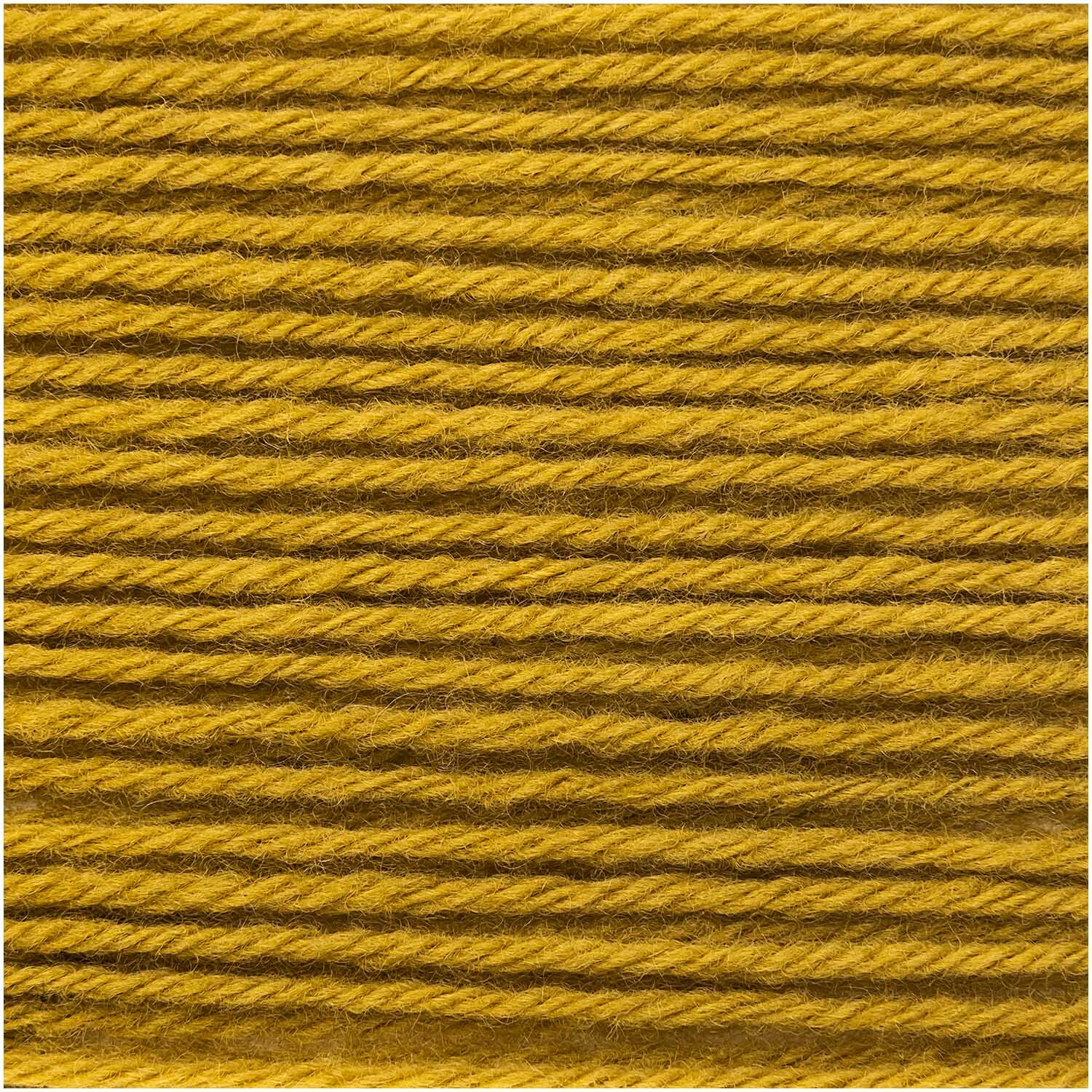 Luxury Super 100 Superfine Wool dk 50g 165m Farbe Senf von Rico Design Luxury Super 100 Superfine Wool dk in Senf von Rico Design, 50g Knäuel, 165m Länge, Nahaufnahme der weichen Wollstruktur.