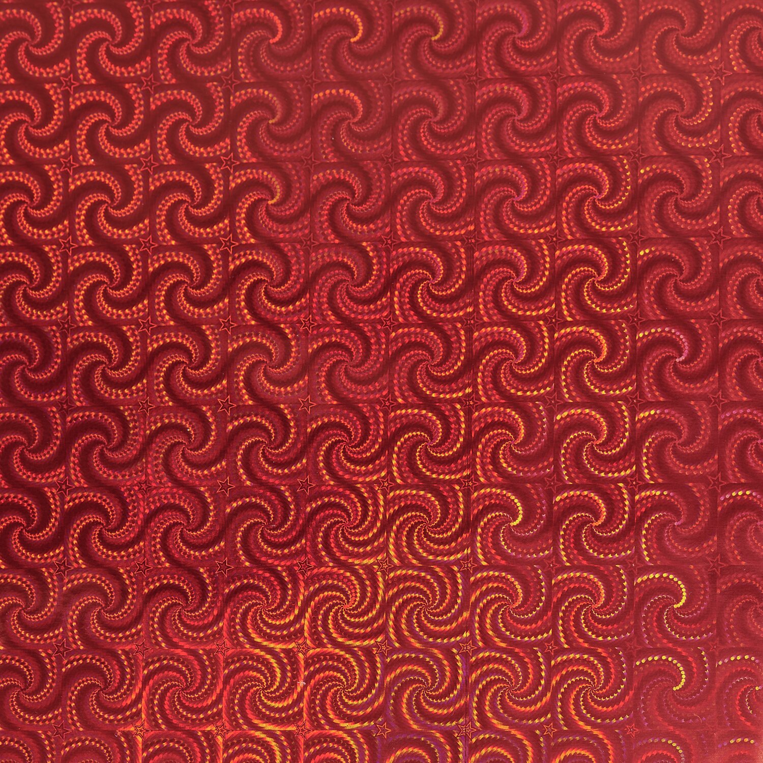 Paper Poetry Geschenkpapier holographisch mit Sternen 200x70cm 80g/m² Farbe Rot von Rico Design Paper Poetry Geschenkpapier holographisch mit Sternen zeigt ein rotes, spiralförmiges Muster. Ideal für kreative Geschenkverpackungen.