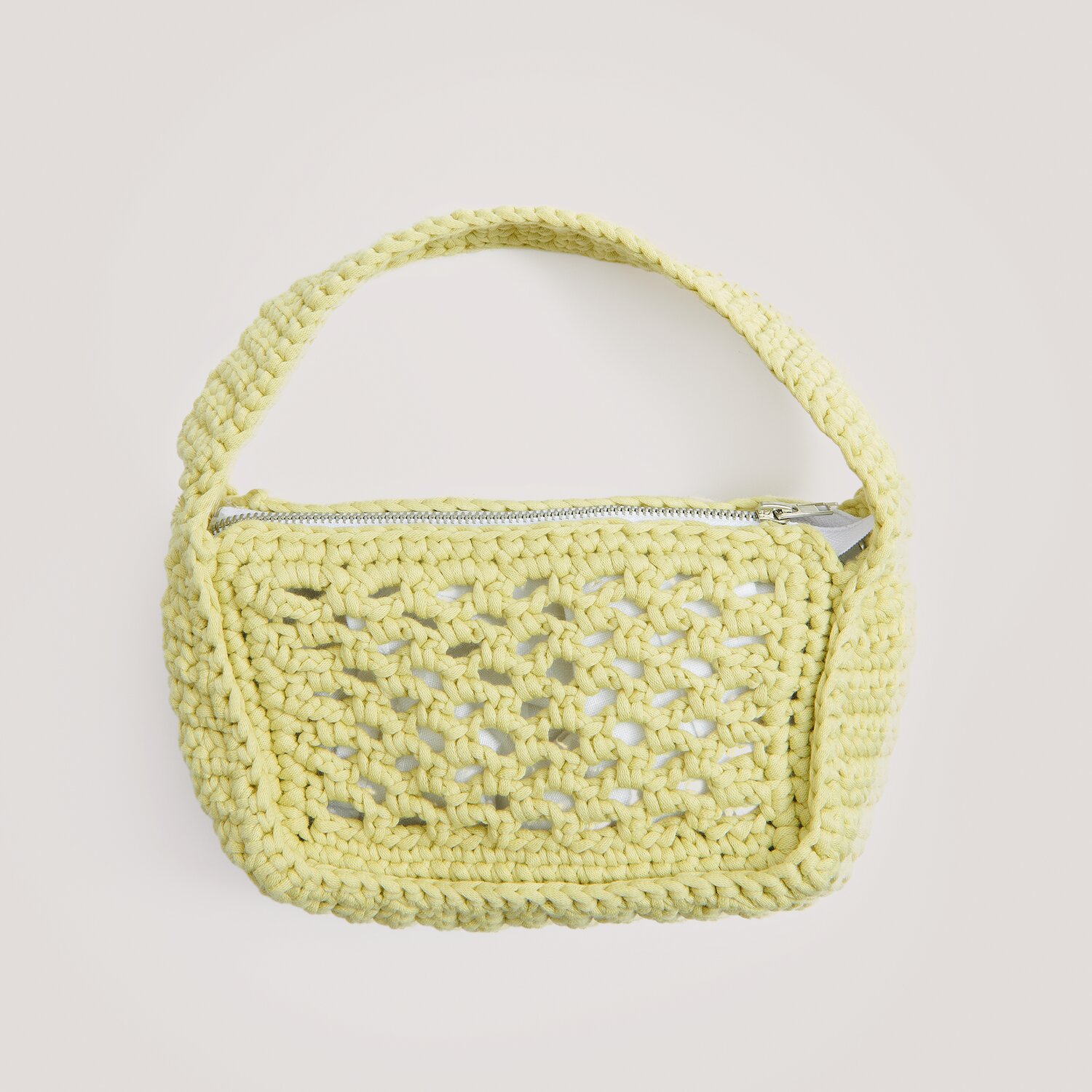 Häkelset Mini-Häkeltasche Modell 11 A in Gelb aus Die Neue Masche No. 15, handgefertigt mit Reißverschluss.