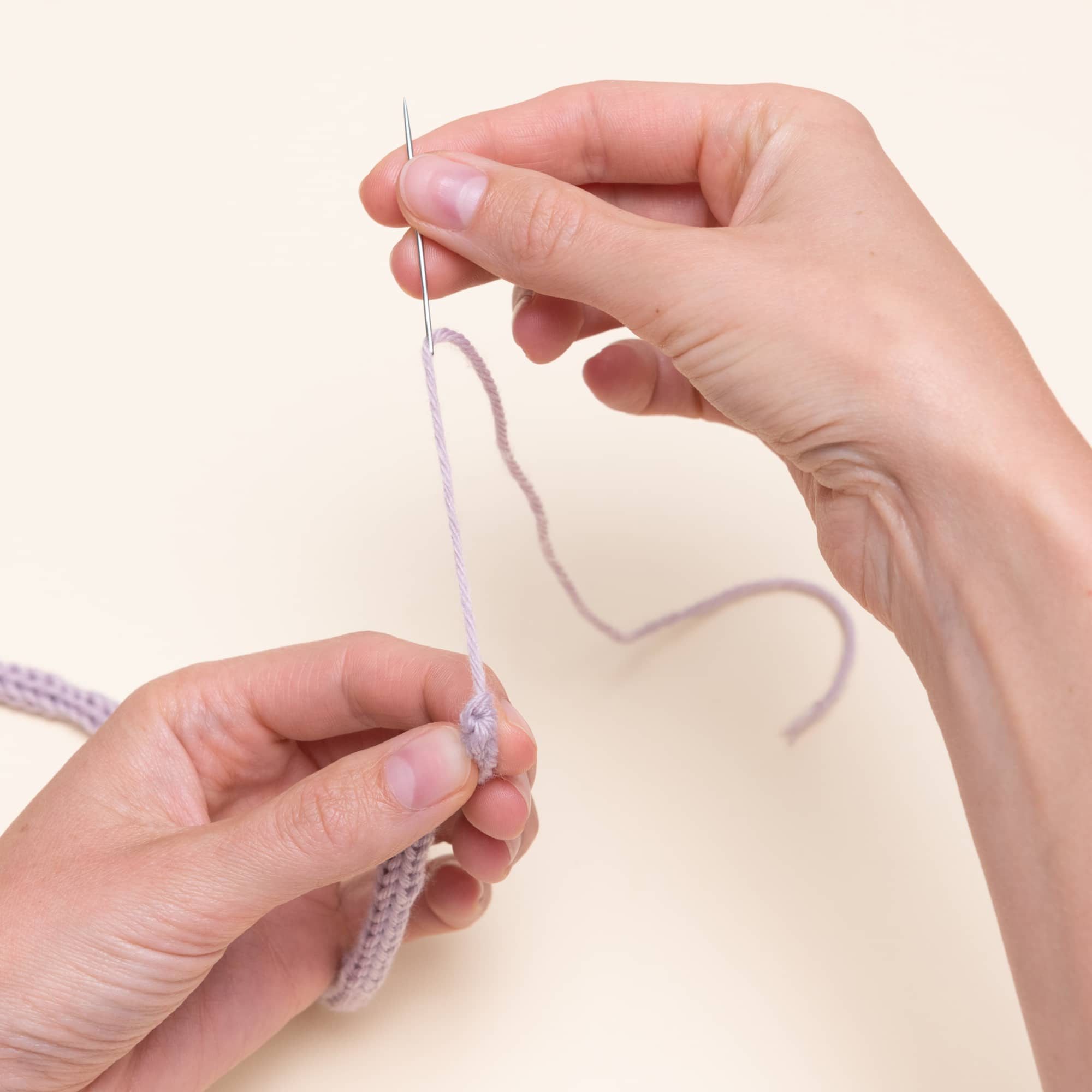 Schritt 16 in der Bedienung einer Strickmühle