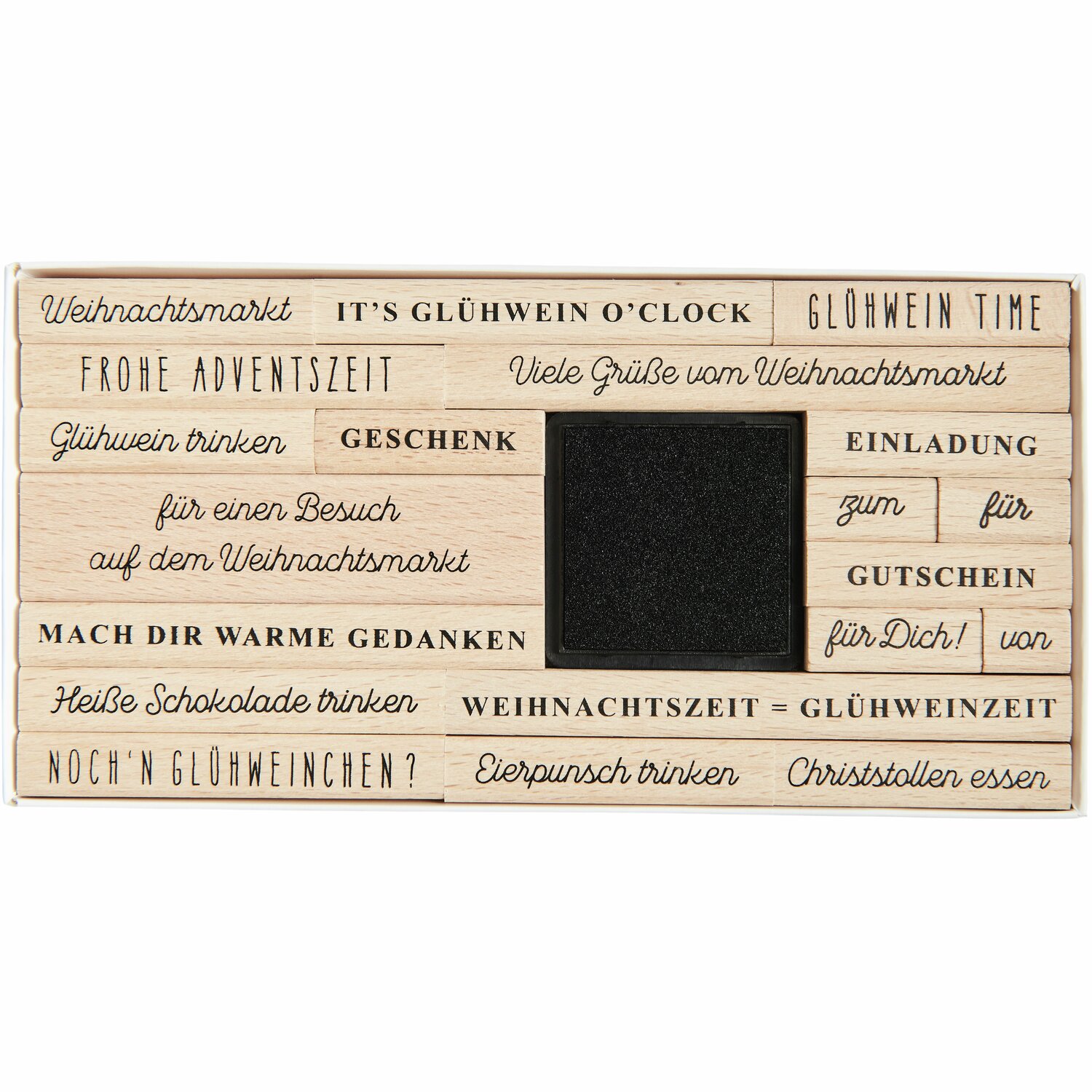 Stempelset Weihnachtsmarkt Types: 20-teiliges Set mit verschiedenen Weihnachtsmotiven und Sprüchen. Ideal für kreative Bastelprojekte zur Adventszeit.