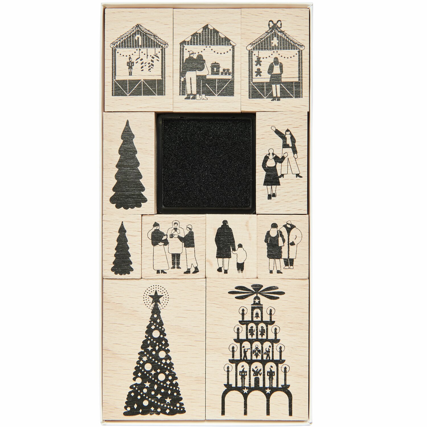 Stempelset Weihnachtsmarkt: 11-teiliges Set von Rico Design mit Motiven von Weihnachtsbäumen und Marktständen.